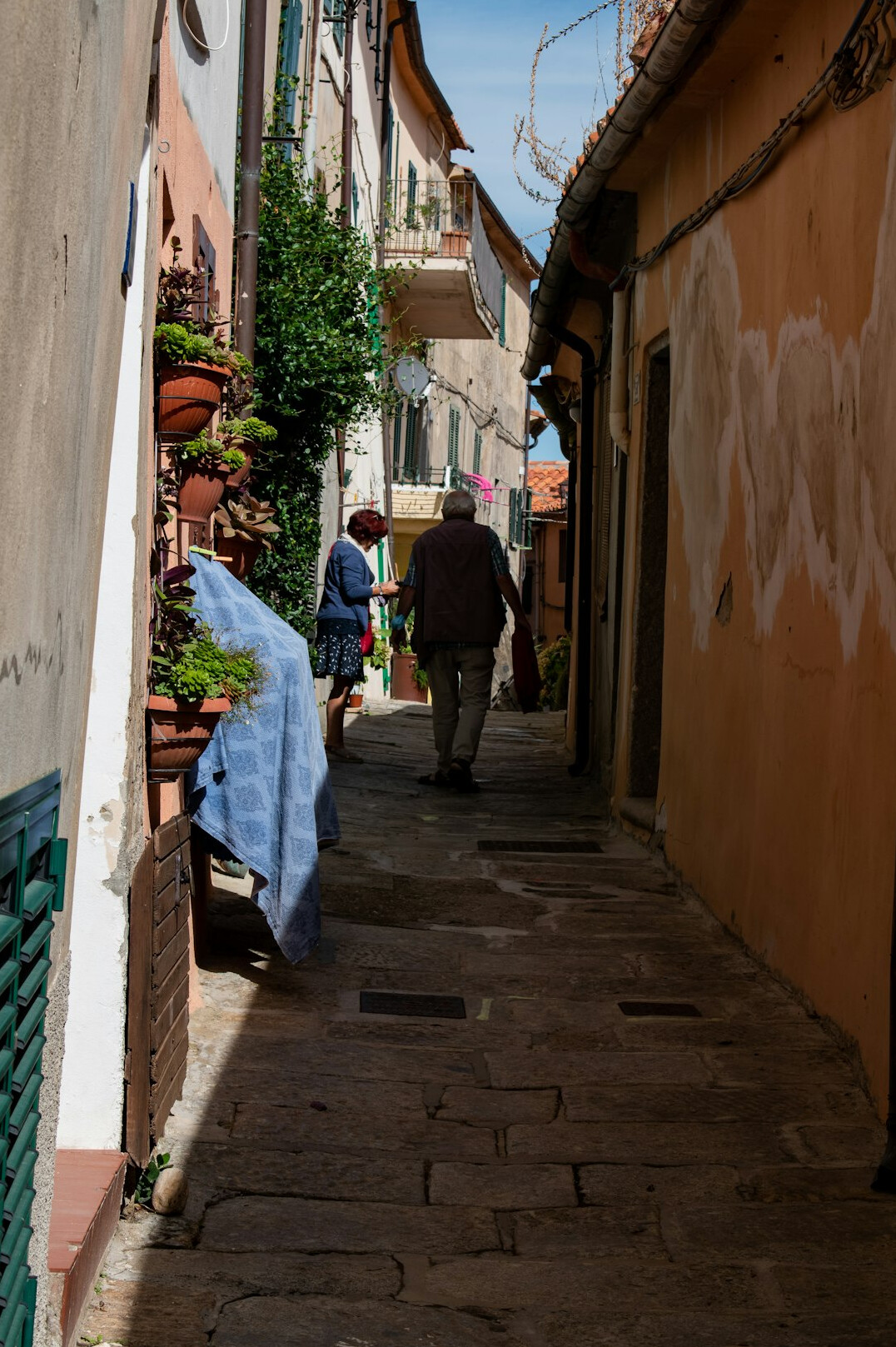 Documentary photographer taking pictures on a small-town street